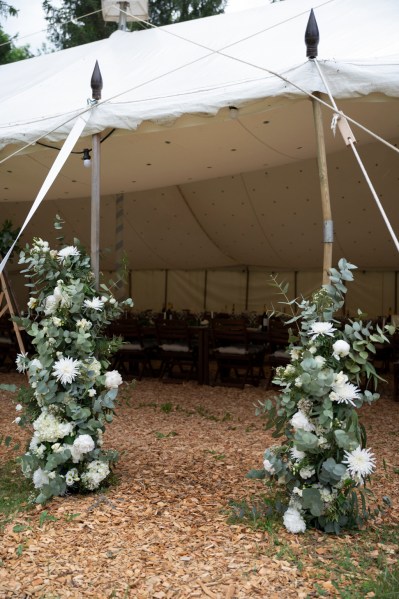 Exterior flower bed marquee tent setting